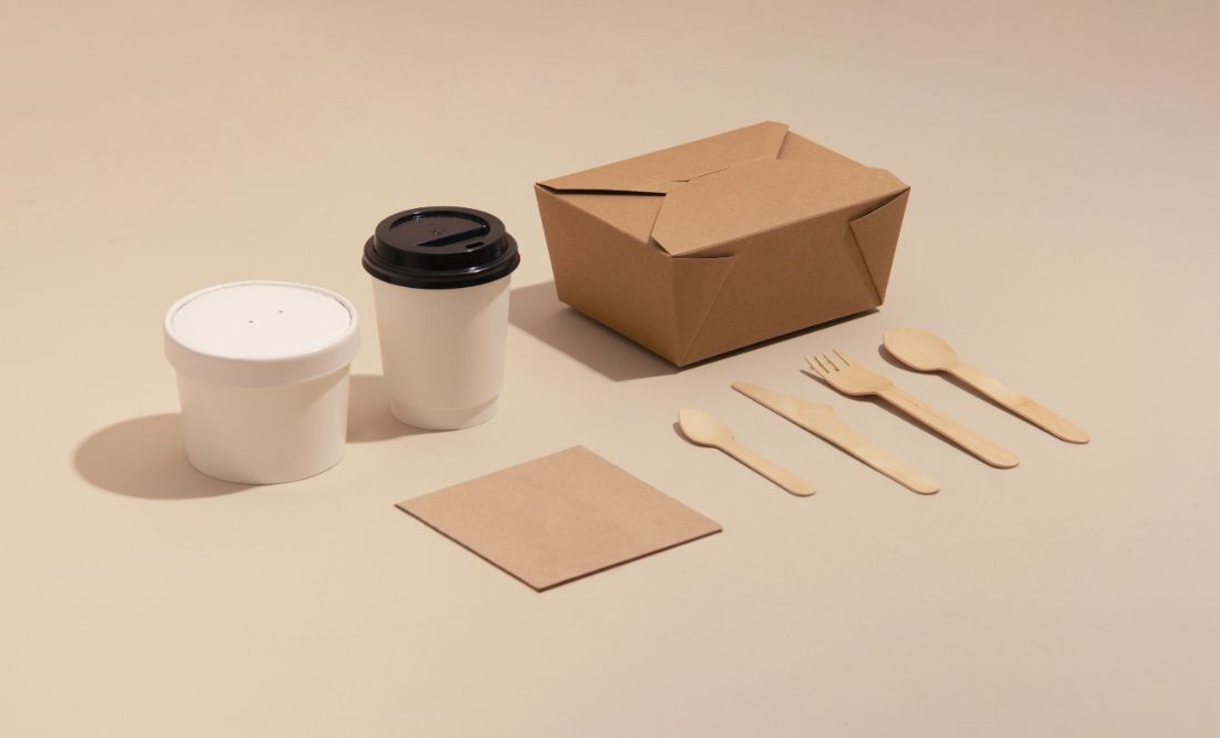 A full takeaway set — cup, container, bowl, serviette, cutlery